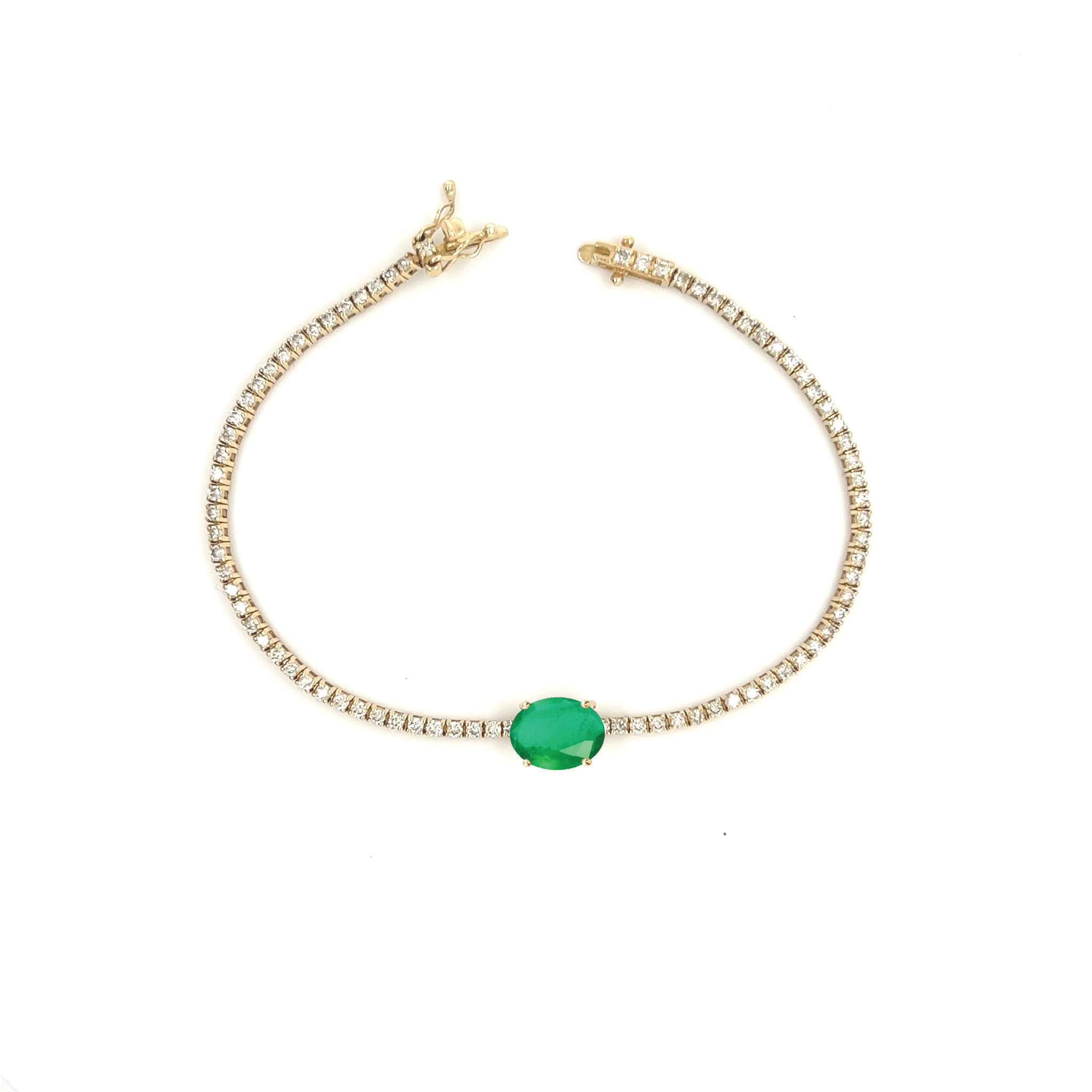 Oval Cut Emerald Whisper Tennis Bracelet